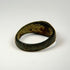 Side angle of Sassanian silver and carnelian ring showing the raised gemstone setting and aged band