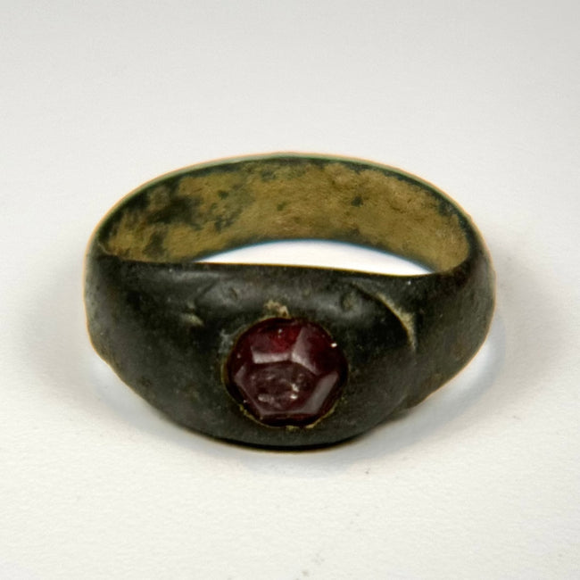 Sassanian Empire silver signet ring showing the carnelian gemstone, historic band construction, and age-related wear