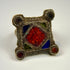 Antique North African or Middle Eastern silver ring with rectangular bezel and hand-incised geometric decoration