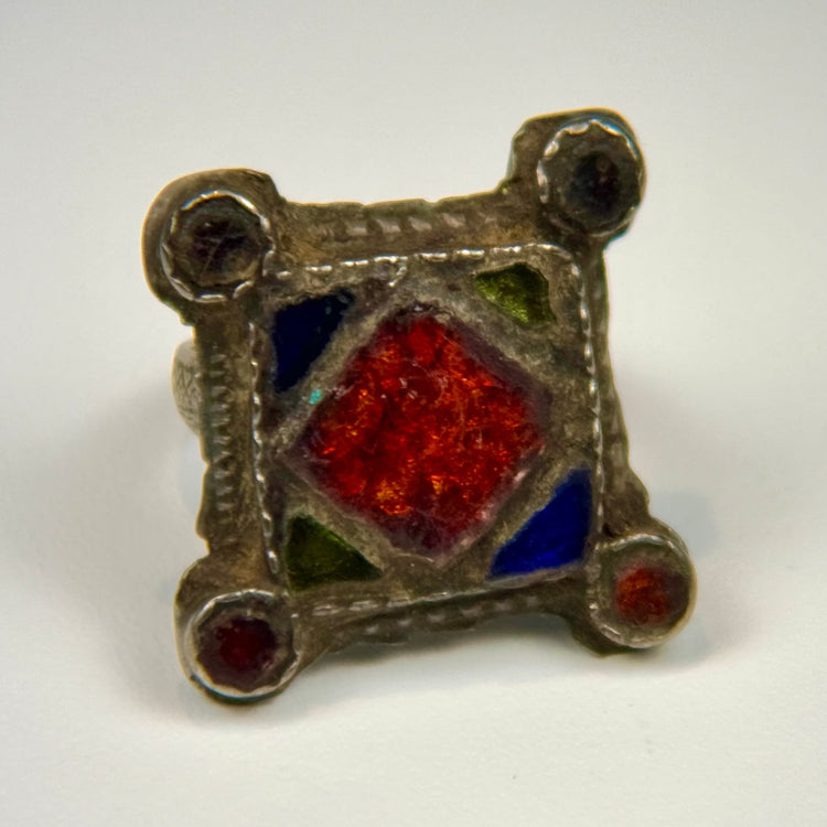 Antique North African or Middle Eastern silver ring with rectangular bezel and hand-incised geometric decoration