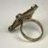 Antique Middle Eastern silver ring with rectangular bezel, incised decoration, and centuries-old surface wear