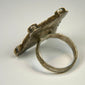 Antique Middle Eastern silver ring with rectangular bezel, incised decoration, and centuries-old surface wear