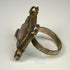 Traditional silver folk ring with hand-chased symbolic patterns and naturally developed dark patina