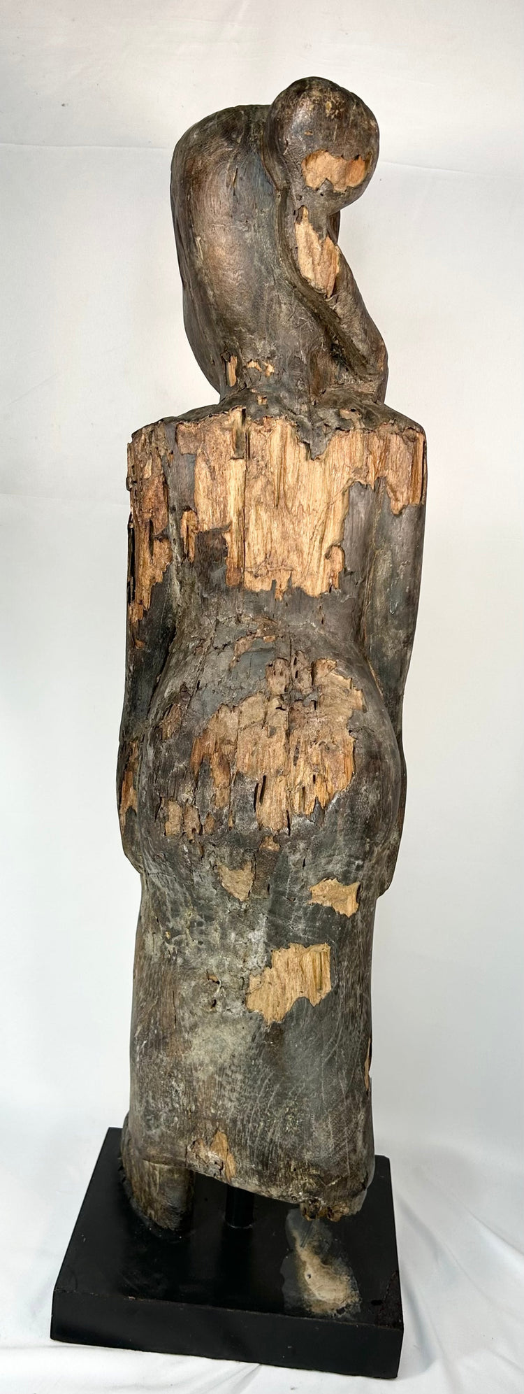 Antique Dayak ceremonial sculpture with missing foot and age cracks