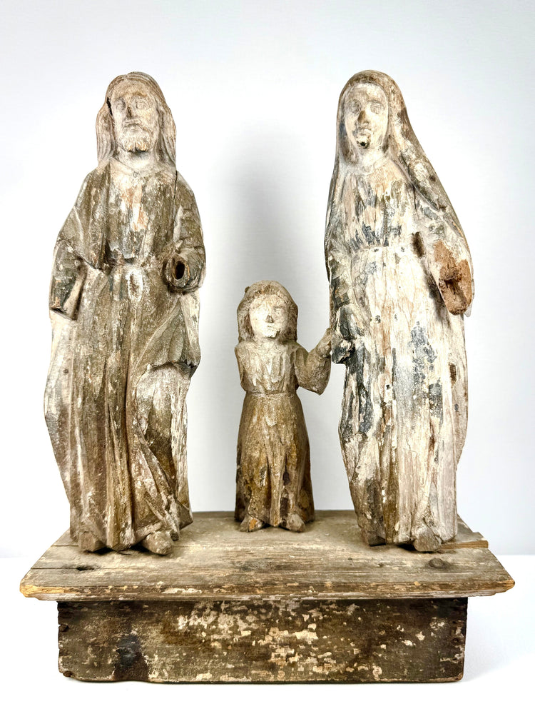 Antique carved wood Holy Family set on blocky stand with chipped grey and white paint