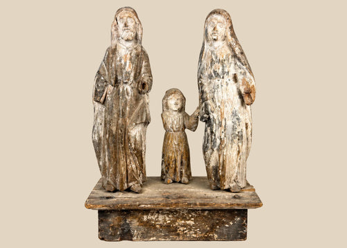 Antique Spanish Colonial Santo sculpture of the Holy Family, 19th century, hand-carved and painted wood figures depicting Joseph, Mary, and Child on a wooden base with aged patina.