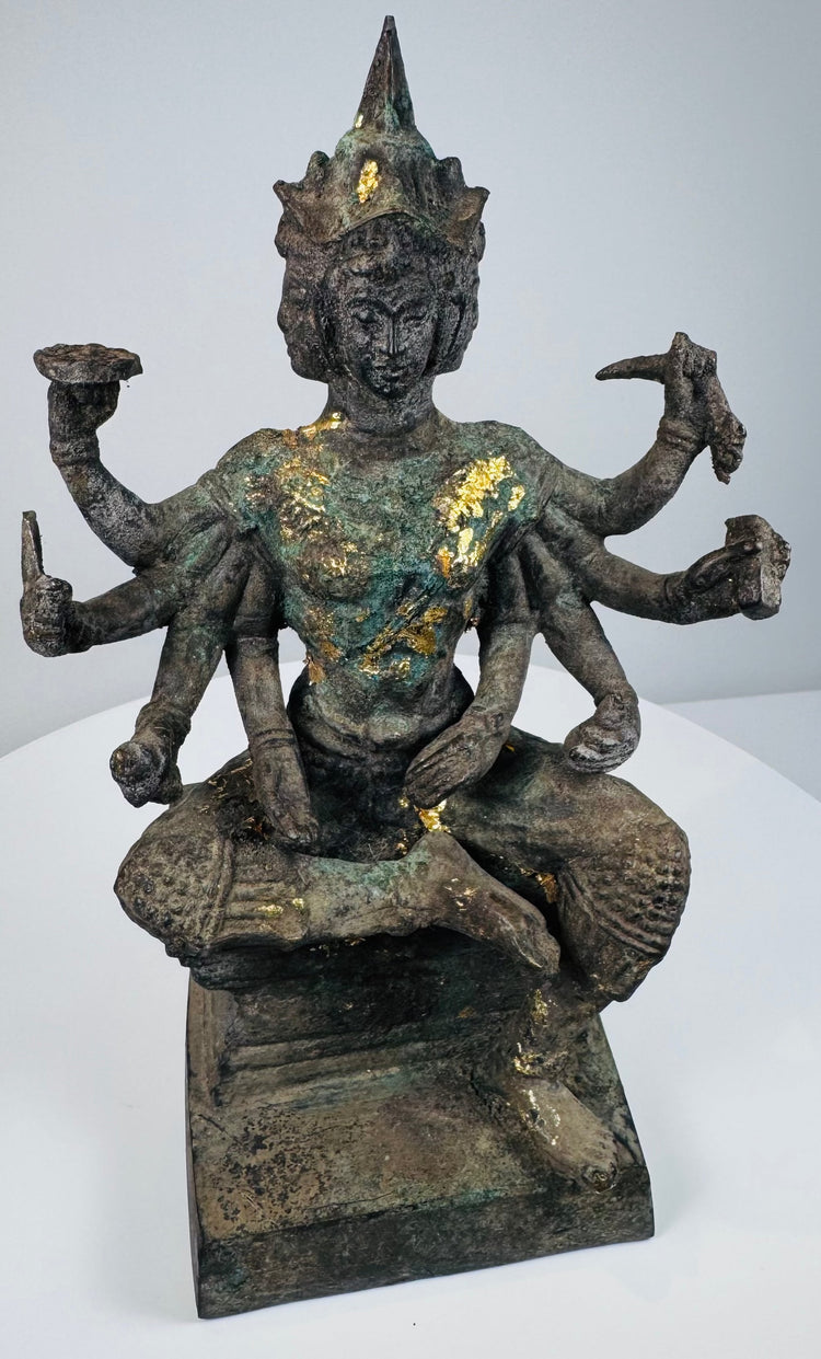 Full-length view of the four-faced Phra Phrom bronze with aged gilding