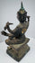 Side view of the eight-armed Thai Brahma statue with verdigris patina