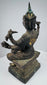 Side view of the eight-armed Thai Brahma statue with verdigris patina