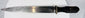 Antique Himalayan single-edged knife with tapered blade and dark horn handle