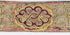 Close-up of Tibetan embroidered belt with colourful scroll and key-pattern decoration