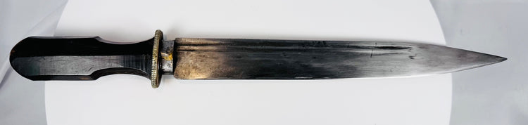 Forged steel Tibetan dagger with faceted horn grip and silvered guard