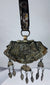 Authentic Himalayan ceremonial ornament featuring turquoise, coral, silvered copper alloy, and ornate repoussé craftsmanship.