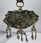 Himalayan silvered copper gau pendant with coral accents, articulated drops, and original textile suspension.