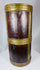 Himalayan wooden storage vessel with brass bindings, aged patina, and cylindrical form.