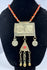 Central Asian Turkmen ceremonial necklace featuring silver-toned metal, coin pendants, and a triangular tumar pendant.