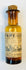 Close-up of Victorian apothecary bottles with paper labels and aged patina