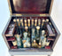 Detailed view of brass key and locking mechanism on antique medical cabinet