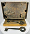 Forged iron door lock with large skeleton key and wooden mount