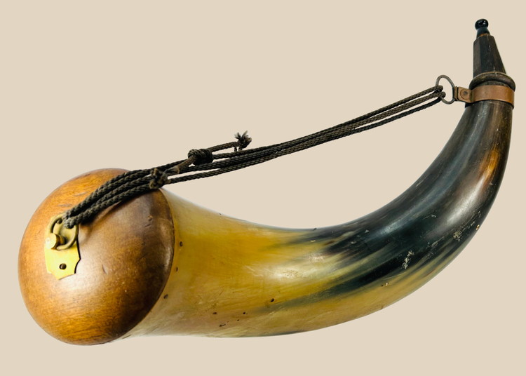 Late 18th to early 19th century black powder horn with wood plug, brass mount, and carry cord