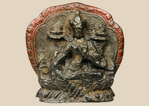 Tibetan bronze Buddhist devotional plaque with seated deity in relief