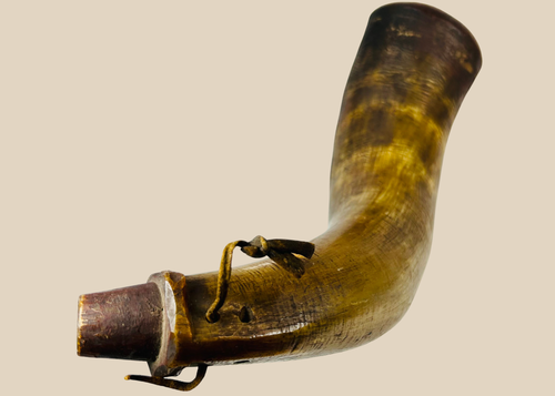 Close-up of wooden base plug on historic firearms powder horn