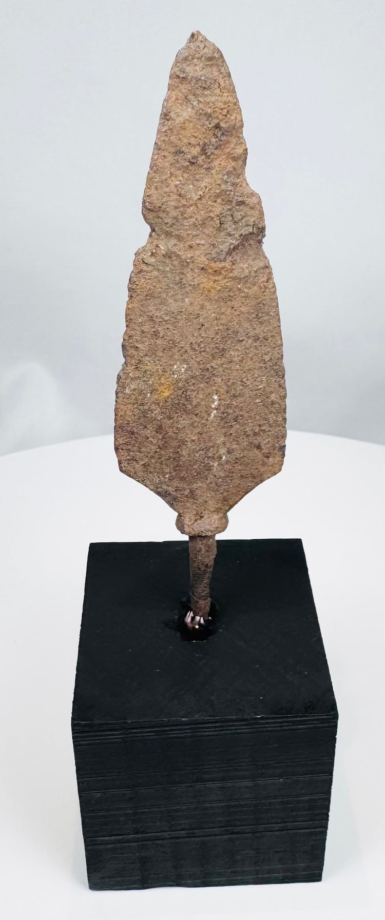 Archaeological European iron javelin point with elongated tip and surviving tang