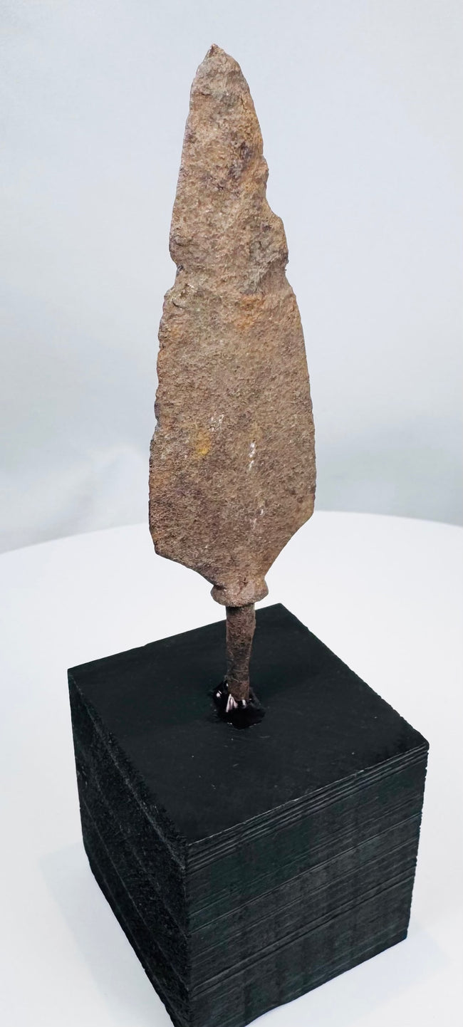 Ancient leaf-shaped hunting spear point with irregular corroded edges