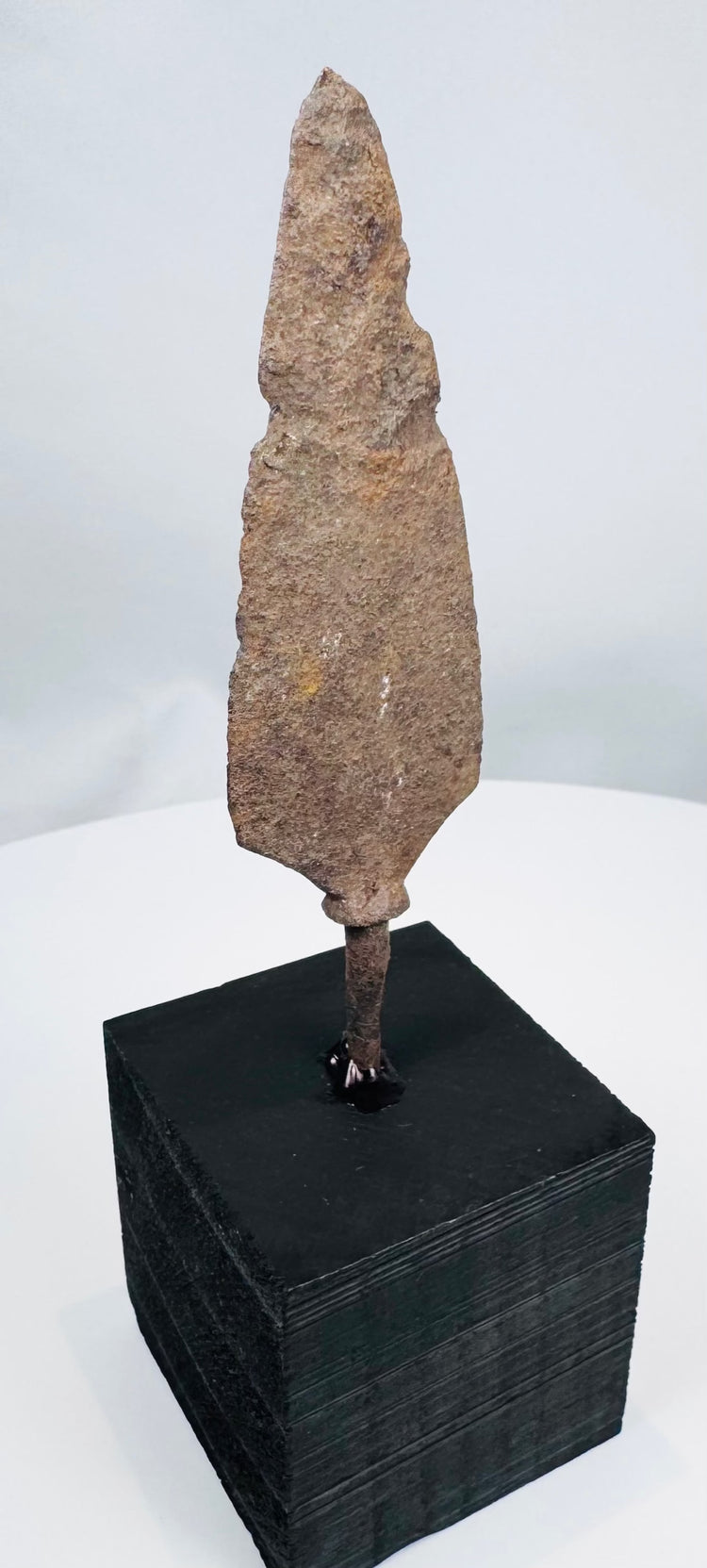 Ancient leaf-shaped hunting spear point with irregular corroded edges