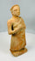 Decorative terracotta figure with aged patina and texture