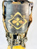 Gold-painted mon family crest on lacquered cuirass of authentic Muromachi Period samurai armor.