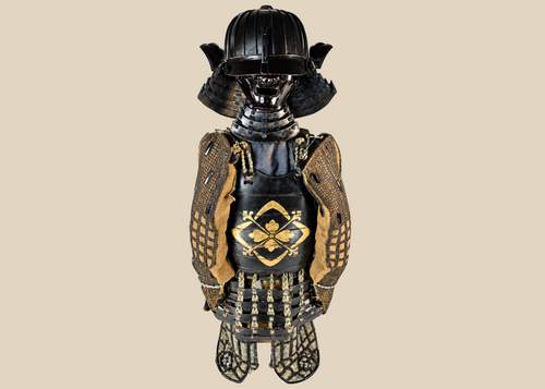Authentic Japanese samurai armor set from the Muromachi Period (1333–1573), featuring a black-lacquered 24-plate suji-bachi kabuto helmet, menpo facial armor, gold-painted mon on the cuirass, Edo-period silk lacing, and chainmail sleeves, displayed on a wooden stand.
