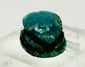 Small New Kingdom scarab bead amulet with strong blue coloration and historic aging