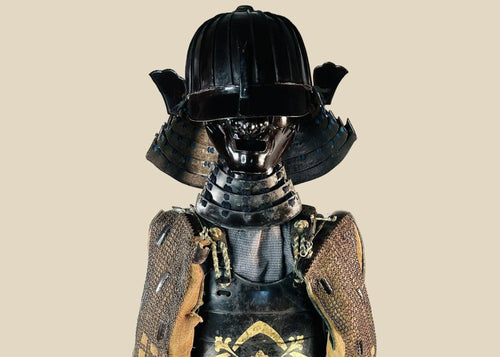 Authentic Japanese samurai armor set from the Muromachi Period (1333–1573), featuring a black-lacquered 24-plate suji-bachi kabuto helmet, menpo facial armor, gold-painted mon on the cuirass, Edo-period silk lacing, and chainmail sleeves, displayed on a wooden stand against a white background
