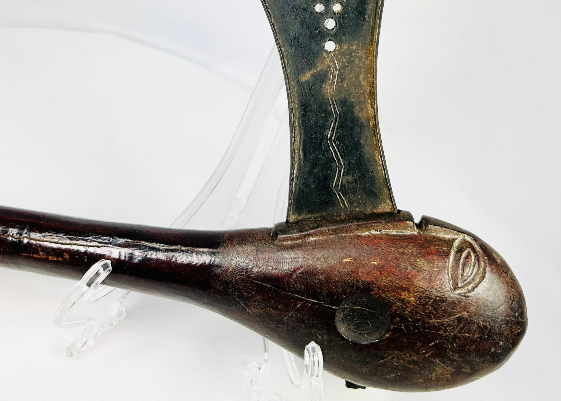Late 19th-century Luba prestige axe from Central Africa with fan-shaped iron blade, carved hardwood haft, and eye-motif pommel, ceremonial regalia