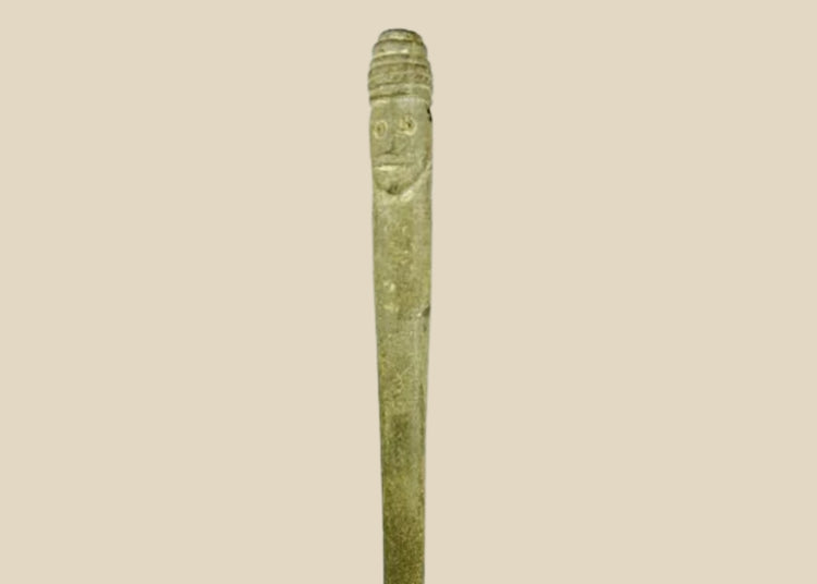 Ancient Bactrian dual-faced whetstone, 2nd millennium BCE, carved from chlorite or steatite with symmetrical features and natural patina.
