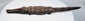 West African crocodile sculpture with dark patina and areas of exposed lighter wood