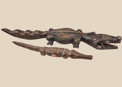 Pair of carved wooden crocodile figures attributed to Bamana and Bozo traditions of Mali