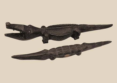 Pair of carved wooden crocodile figures attributed to Bamana and Bozo traditions of Mali