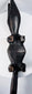 Side view of elongated Malian crocodile carving with segmented tail and carved legs