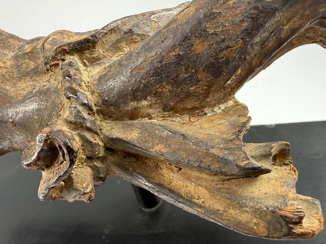 Antique Southern European devotional sculpture of Christ with aged patina cracking and surface losses