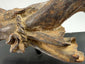 Antique Southern European devotional sculpture of Christ with aged patina cracking and surface losses