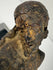 Baroque religious sculpture of Christ carved in wood with detailed anatomy and draped loincloth