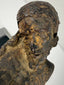 Baroque religious sculpture of Christ carved in wood with detailed anatomy and draped loincloth