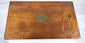 Historic apothecary case containing clear and amber pharmaceutical bottles