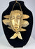 Mid-20th-century Lega tribal pendant mask from Congo carved bone face