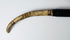 Detail of feather and hair ornaments attached to the Dayak sword hilt