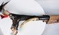 Reverse view of hand-forged Mandau blade showing asymmetrical construction