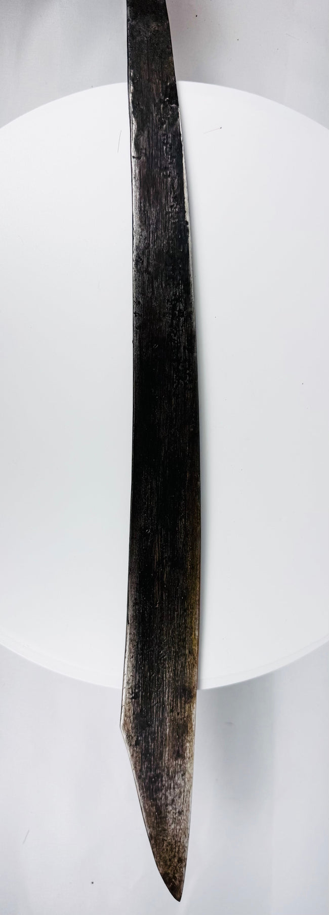 Complete Dayak Mandau sword set with blade, carved sheath, ornaments, and side knife