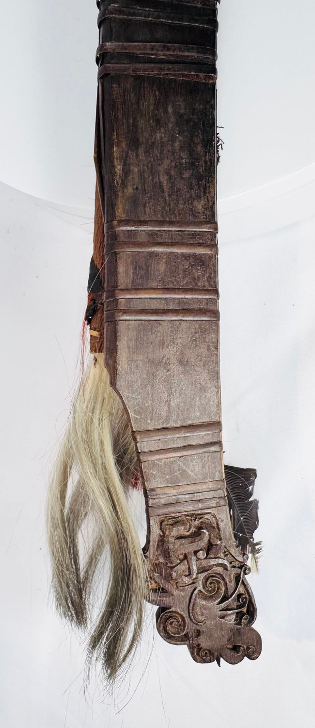 Original Dayak wooden scabbard with deep relief carving and binding strips